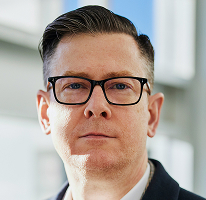Alexander Hughes, CEO eksekutif di perusahaan crypto trading, potret